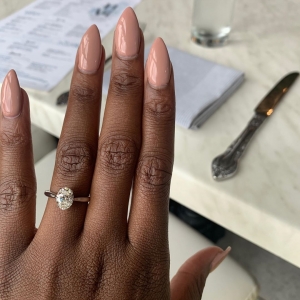 Engagement ring photos on hands with 